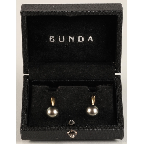 52A - Ladies pair of Bunda cultured pearl earrings, set in 18ct yellow gold.