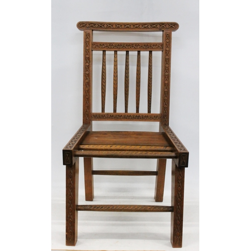 599 - Early 20th century Caithness chip carved Arts and Crafts crofters chair, H81cm.