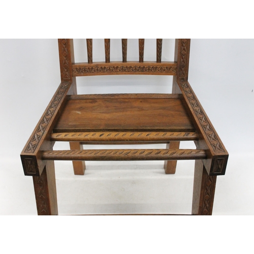 599 - Early 20th century Caithness chip carved Arts and Crafts crofters chair, H81cm.