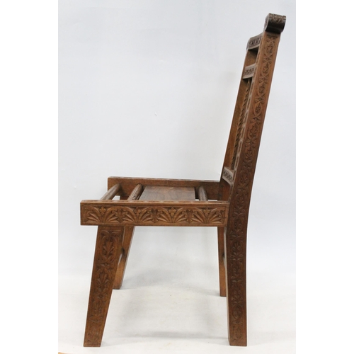 599 - Early 20th century Caithness chip carved Arts and Crafts crofters chair, H81cm.