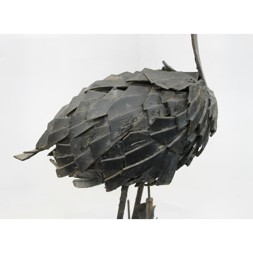 600 - Large free standing wrought iron garden ornamental sculpture of a water bird holding a fish, togethe... 