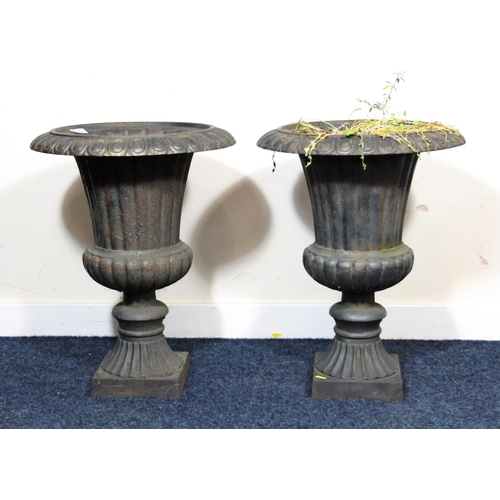 601 - Pair of cast iron campagna style garden urns, H56cm.