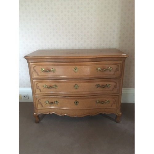 607 - Modern French oak harlequin bedroom suite comprising a four door armoire wardrobe, 220cm long, chest... 