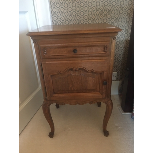 607 - Modern French oak harlequin bedroom suite comprising a four door armoire wardrobe, 220cm long, chest... 