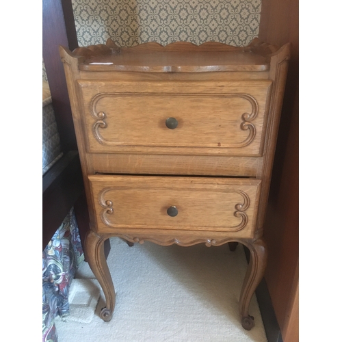 607 - Modern French oak harlequin bedroom suite comprising a four door armoire wardrobe, 220cm long, chest... 