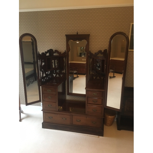 608 - Early 20th century mahogany Duchess style dressing table with central cheval mirror flanked by two p... 