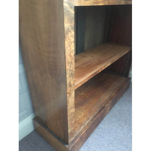 613 - Walnut veneered open bookcase, the faux marble top above turned frieze over four open shelves, raise... 