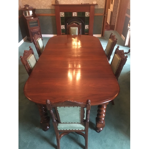 617 - Victorian mahogany telescopic extending dining table raised on large barley twist supports capped wi... 