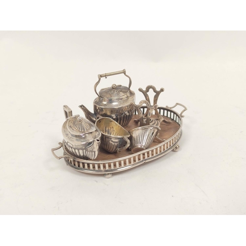 369 - Edwardian miniature four piece silver teaset, oval part fluted including a kettle on stand with tiny... 