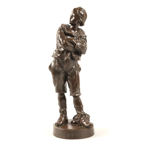 255 - After Anton Nelson (French 1880-1910) 'Defi' bronze figure of a boy with arms crossed and cap, Signe... 