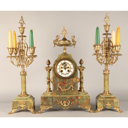 288 - Three piece garniture clock set, by Brysons, Paris, 50cm high.