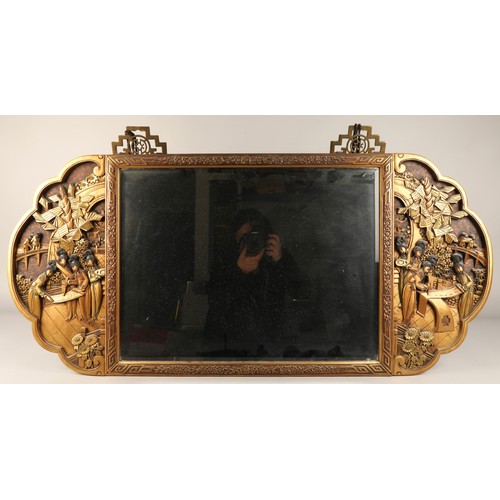 531 - Oriental wall mirror, decorated in relief with ladies in garden  on brass mounts 112 x 51 cm