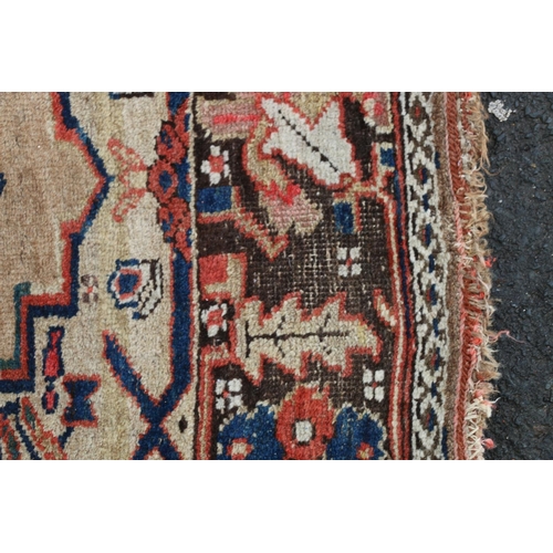 619 - Persian Serab type rug, geometric central medallion on muted beige ground, within conforming borders... 