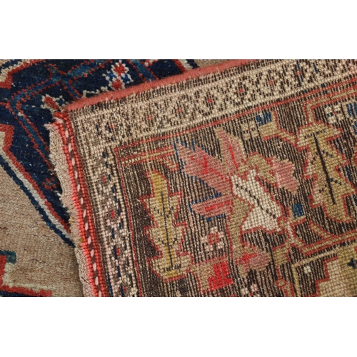 619 - Persian Serab type rug, geometric central medallion on muted beige ground, within conforming borders... 