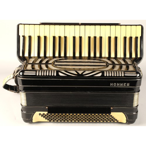 337 - Hohner 2 +1 Accordian circa 1940s, black lacquered body, in wooden carry case