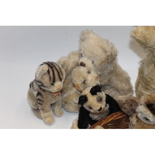 1087 - Vintage Steiff animal models to include Snobby, Susi, Panada bear standing with open mouth, and a tr... 