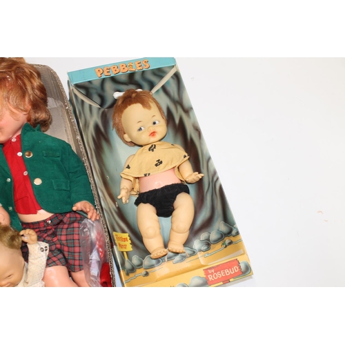 1091 - Rosebud Pebbles Flinstone doll (c.1965) boxed, a large pull string doll in green corduroy jacket, an... 