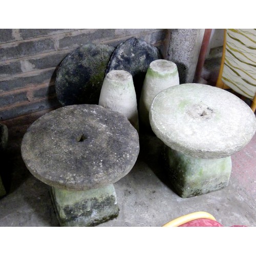 604 - Group of antique staddle stones.