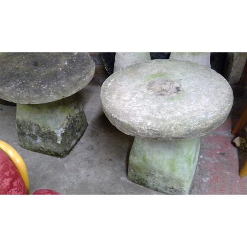 604 - Group of antique staddle stones.