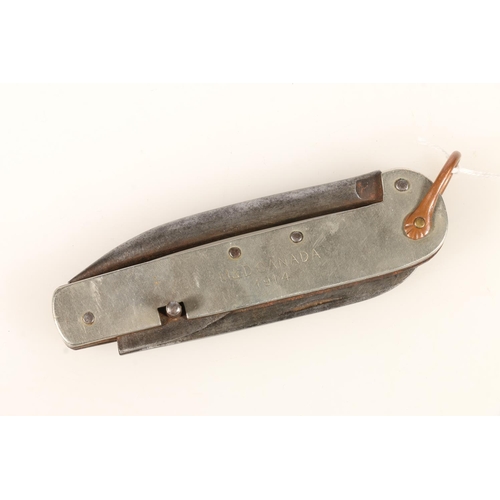 1520 - WWI Canadian army clasp knife, with 8cm long blade, 10cm long spike, and can opener, the sideplates ... 