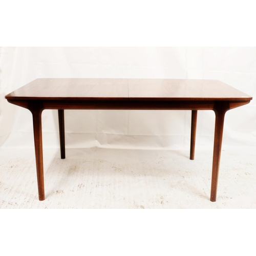 533 - AH McIntosh of Kirkcaldy, a 1960s rosewood extending rectangular top dining table on tapering suppor... 