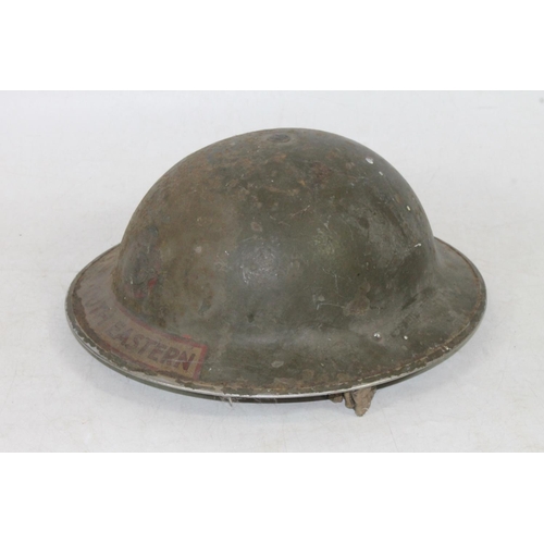 1545 - WWII era National Fire Service South Eastern helmet with NFS decal, having leather insert dated 1938... 