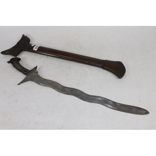1554 - Malaysian kris with typical ornate flamberge blade, white metal wire bound grip and treen birds head... 