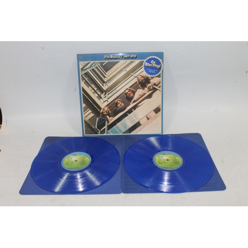 1653 - The Beatles 1962-1966 on red double vinyl and The Beatles 1967-1970 on blue double vinyl.