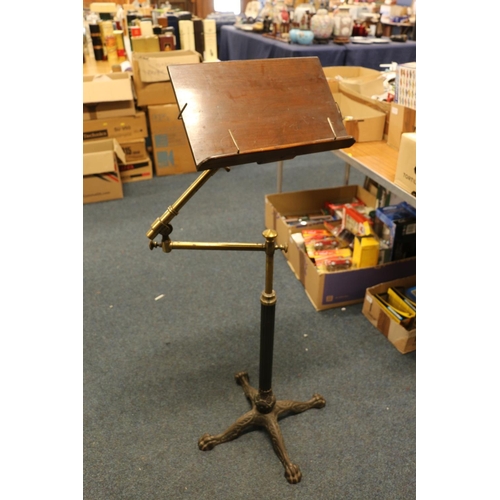 1391 - John Carter of New Cavendish Street London, a adjustable wrought iron, brass and mahogany lectern st... 