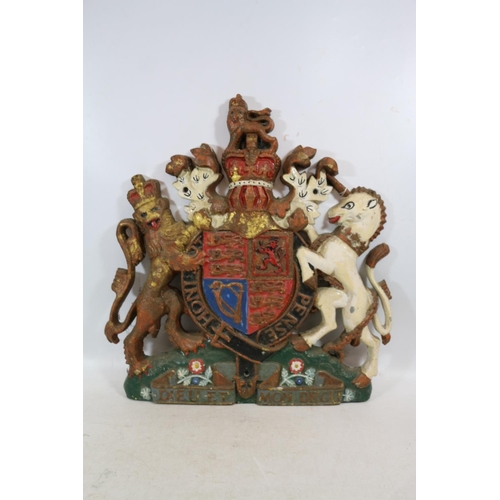 1390 - Cast and painted Royal Warrant metal plaque in the form of the Royal British coat of arms, bears the... 