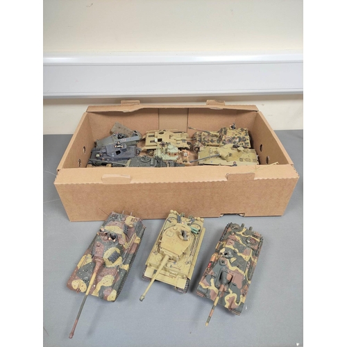 122 - Box of military model vehicles to include a German Tiger I tank, a King Tiger tank in field paint, C... 