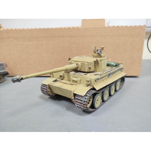 122 - Box of military model vehicles to include a German Tiger I tank, a King Tiger tank in field paint, C... 