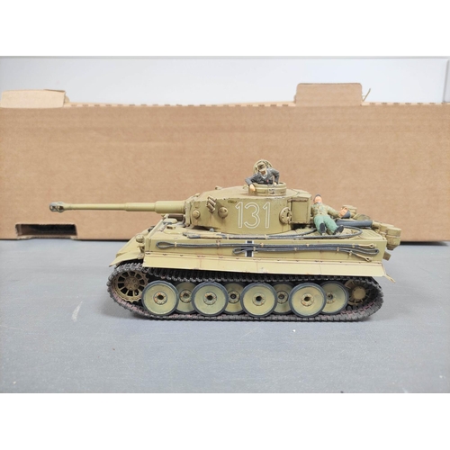 122 - Box of military model vehicles to include a German Tiger I tank, a King Tiger tank in field paint, C... 