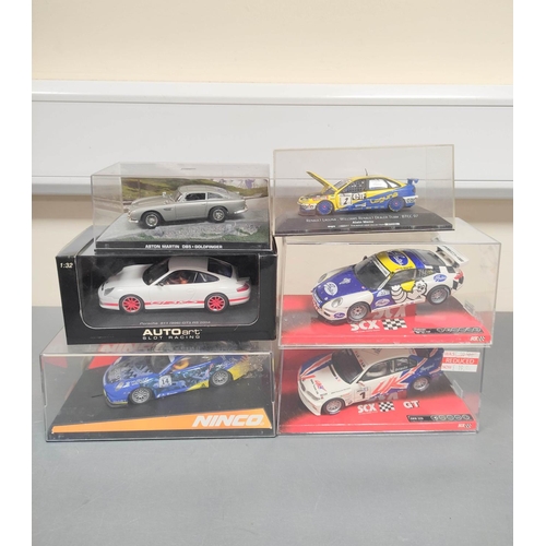 126 - Collection of model racing cars to include a SCX Porsche 911 GT3 Cup 64680, Ninco Porsche 997 GT3 50... 