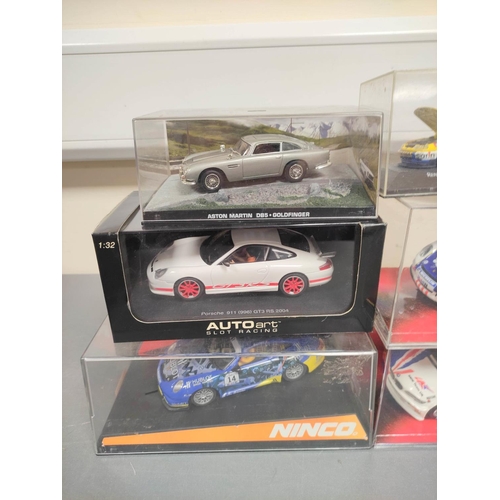 126 - Collection of model racing cars to include a SCX Porsche 911 GT3 Cup 64680, Ninco Porsche 997 GT3 50... 