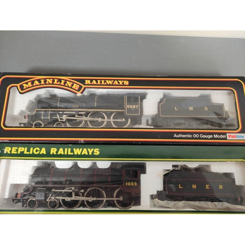 292 - Three boxed 00 gauge locomotives and tenders to include two examples by Replica Railways comprising ... 