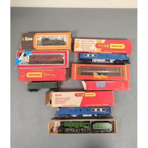 294 - Box of 00 gauge locomotives and rolling stock to include a Tri-ang Diesel Pullman Motor Car R555, a&... 