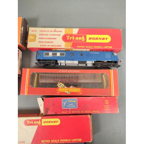 294 - Box of 00 gauge locomotives and rolling stock to include a Tri-ang Diesel Pullman Motor Car R555, a&... 