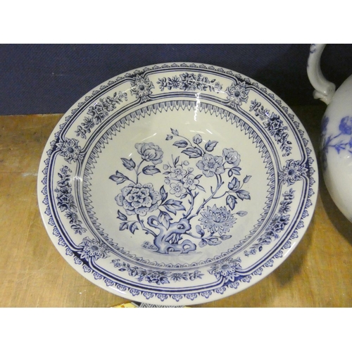 24 - Royal Doulton blue and white chamber pot, various blue and white ware, and a enamel chamber pot.