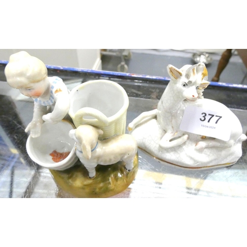 377 - Staffordshire figure of a deer and a continental figure of a girl feeding a lamb.