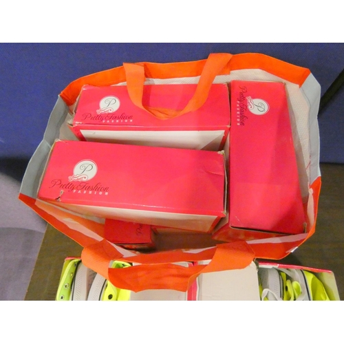 391 - Large bag of new ladies casual canvas trainers. Yellow.