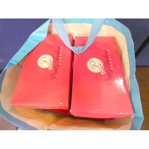 392 - Large bag of new ladies casual canvas trainers.