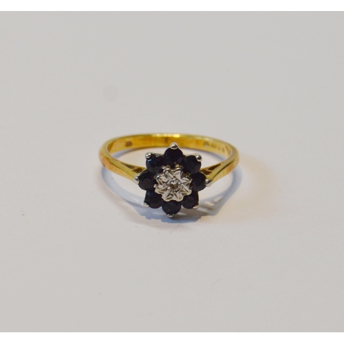 84 - Diamond and sapphire cluster ring in 9ct gold, 1969, size L, 3.1g gross.