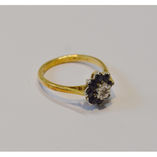 84 - Diamond and sapphire cluster ring in 9ct gold, 1969, size L, 3.1g gross.