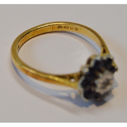 84 - Diamond and sapphire cluster ring in 9ct gold, 1969, size L, 3.1g gross.