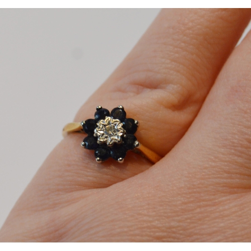 84 - Diamond and sapphire cluster ring in 9ct gold, 1969, size L, 3.1g gross.