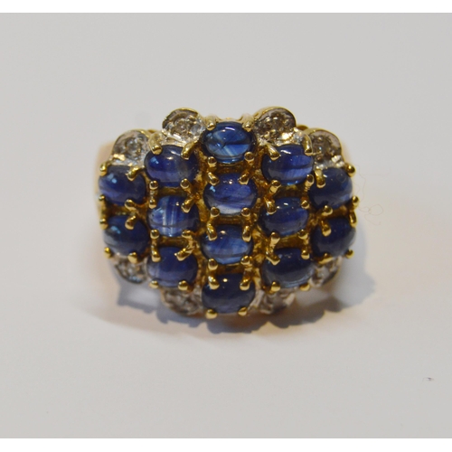 87 - Large pavé-set ring with diamonds and multiple cabochon sapphires, in 9ct gold, size P, 8.2g gross.