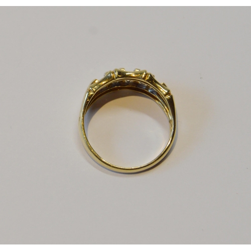 88 - Diamond ring set with ten small brilliants, paired in 9ct gold, size O/P, 3.4g gross.