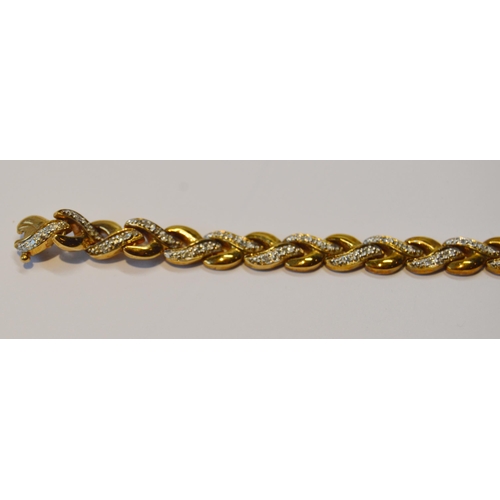 89 - 9ct gold bracelet with plaited links and small diamonds, 19cm long, 9.7g gross.