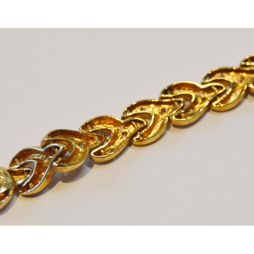 89 - 9ct gold bracelet with plaited links and small diamonds, 19cm long, 9.7g gross.